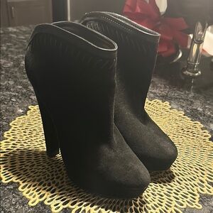 Jimmy Choo Sleek Black Heeled Ankle Boots with Luxurious Suede Texture